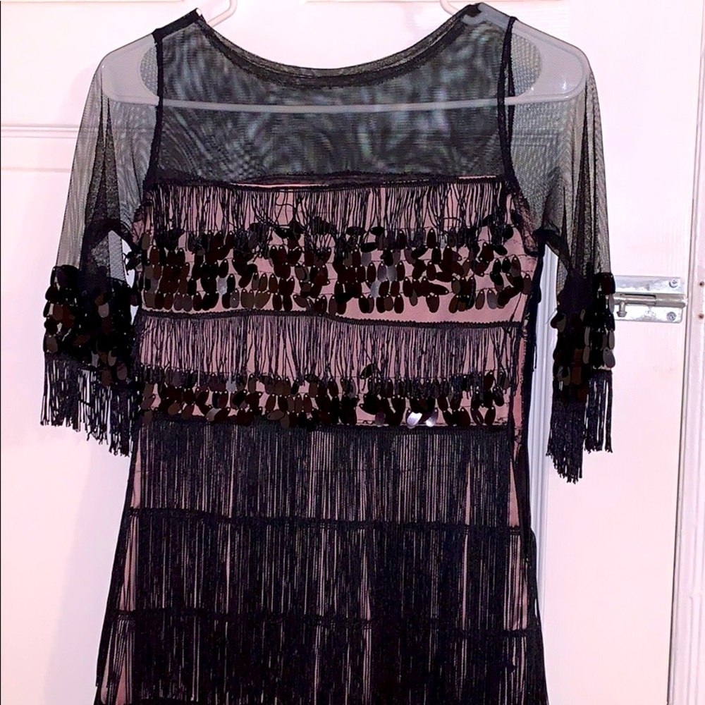 Gorgeous dress Inside purple,outside black color.